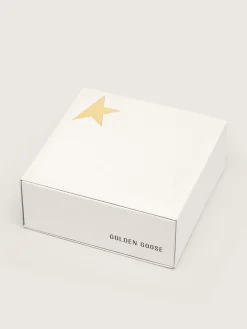 Store Golden Goose Cadarços salpicados em branco e preto com logo dourado em contraste Cor: branco e preto