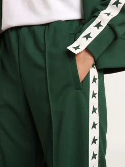 Fashion Golden Goose Calça de jogging feminina verde brilhante com faixa e estrelas Cor: verde brilhante