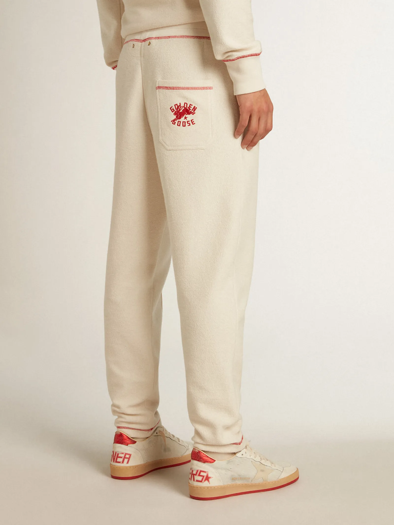 Best Sale Golden Goose Calça de jogging Masculina na cor branco heritage com logo CNY Cor: branco heritage