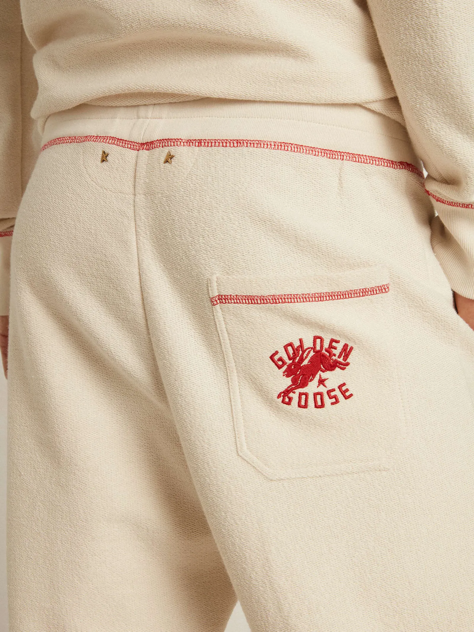 Best Sale Golden Goose Calça de jogging Masculina na cor branco heritage com logo CNY Cor: branco heritage