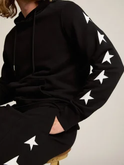 Discount Golden Goose Calça de jogging masculina preta com estrelas brancas Cor: preto