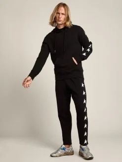 Discount Golden Goose Calça de jogging masculina preta com estrelas brancas Cor: preto
