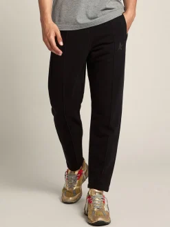 Shop Golden Goose Calça de jogging masculina preta com estrela na frente Star Collection
