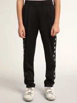 Shop Golden Goose Calça de jogging preta com estrelas brancas em contraste Star Collection