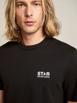 Store Golden Goose Camiseta masculina preta com logo e estrela brancos em contraste Cor: preto