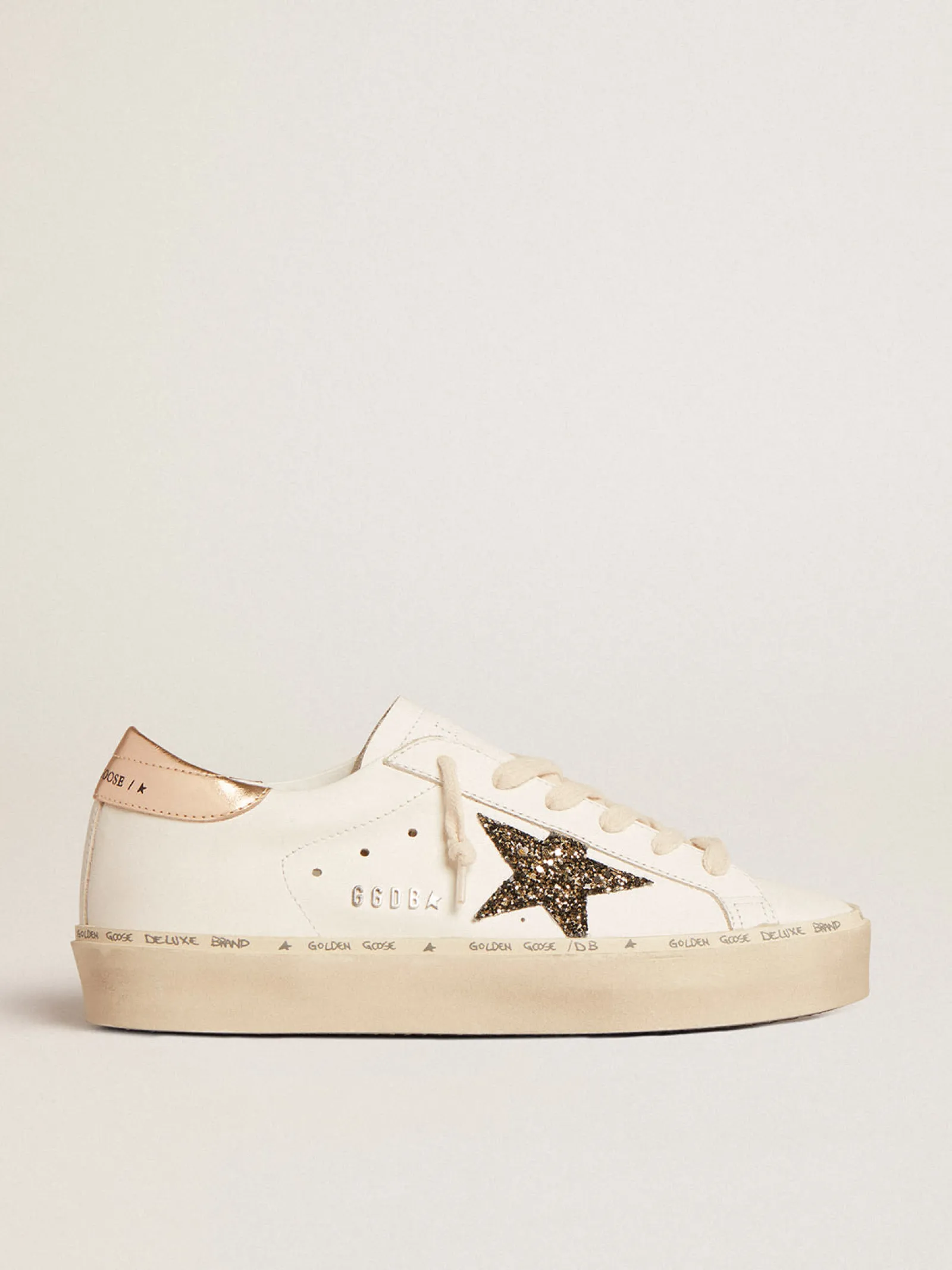 New Golden Goose Hi Star LTD com estrela de glitter preto e dourado e talão dourado Cor: branco