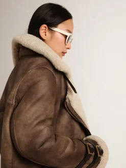 Outlet Golden Goose Jaqueta feminina de couro com gola de shearling Cor: creme com veias cinza de efeito nublado