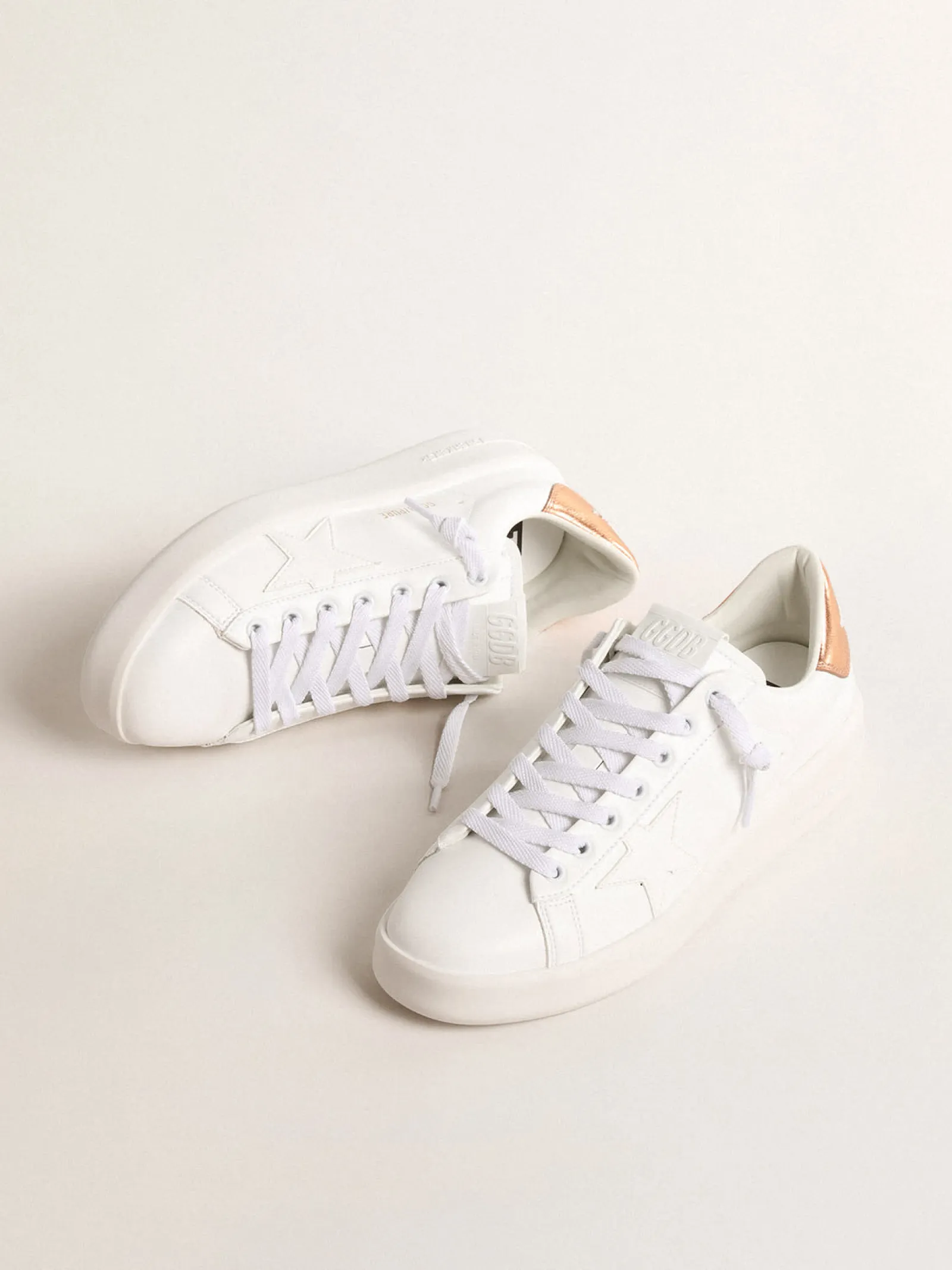 Outlet Golden Goose Purestar de base vegetal com talão de couro metálico bronze Cabedal de base vegetal branco