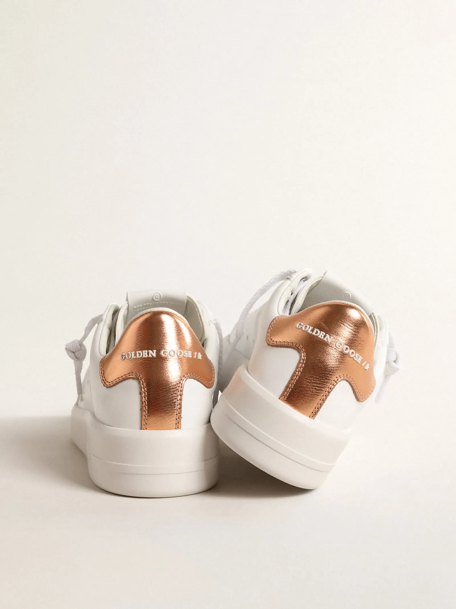 Outlet Golden Goose Purestar de base vegetal com talão de couro metálico bronze Cabedal de base vegetal branco