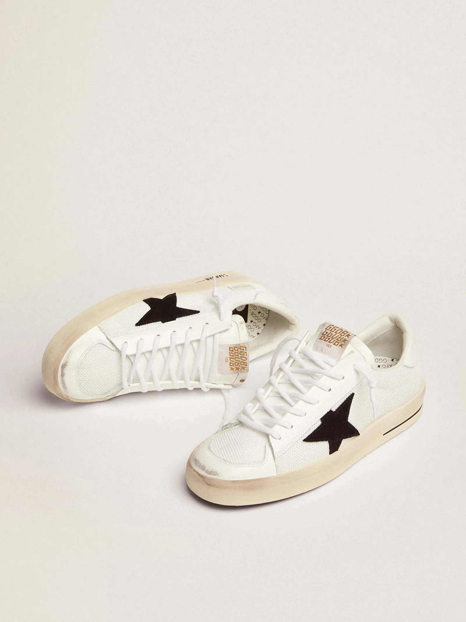 Outlet Golden Goose Stardan masculino de tela branca com estrela de suede preto Cabedal de tela branca