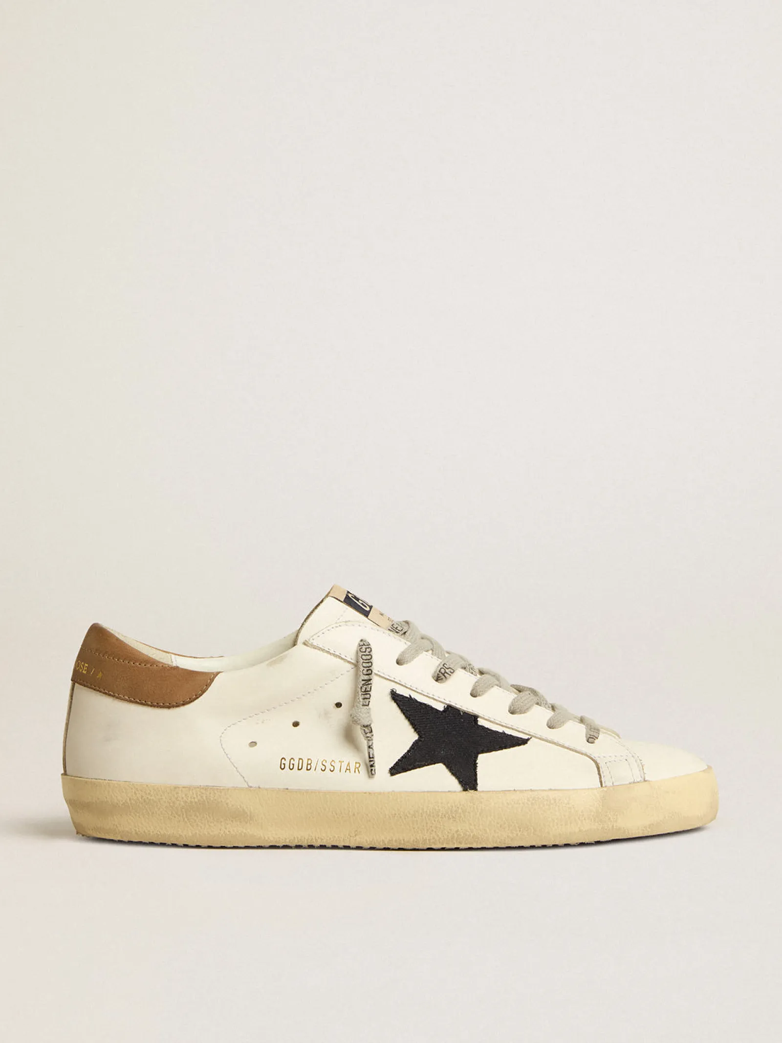Online Golden Goose Super-Star com estrela de lona azul e talão de couro tabaco Cor: branco