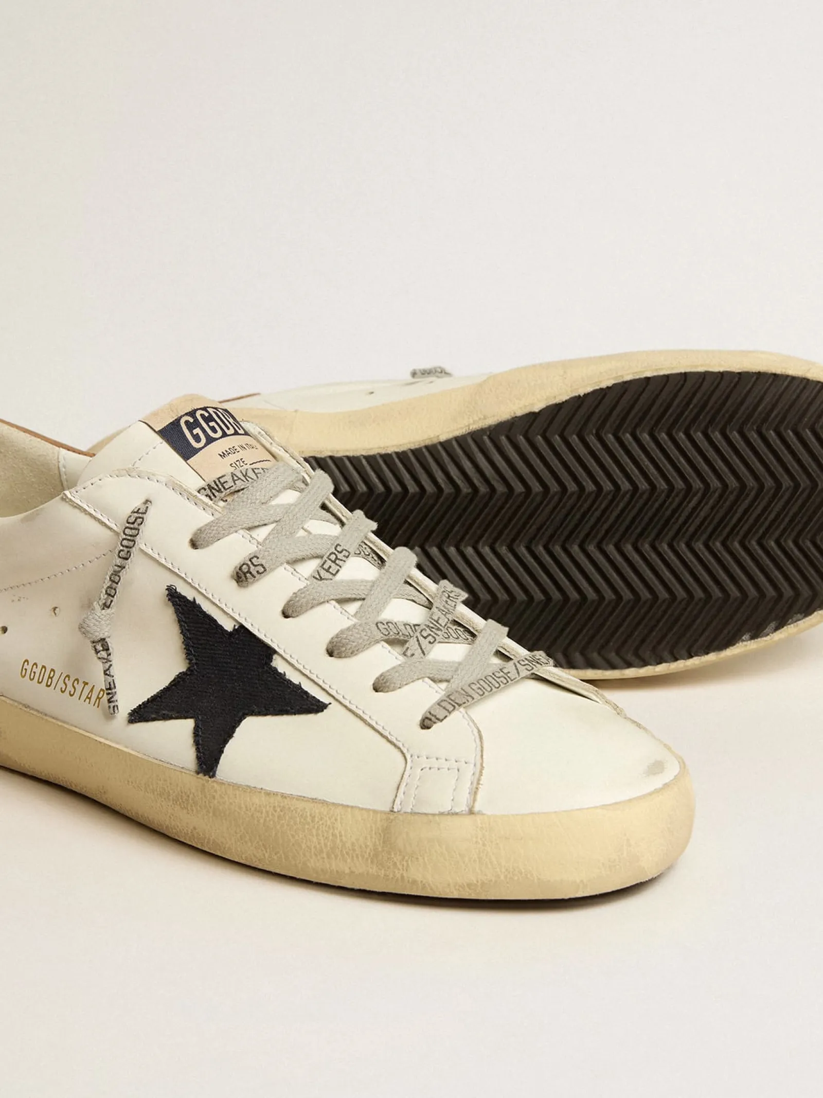 Online Golden Goose Super-Star com estrela de lona azul e talão de couro tabaco Cor: branco