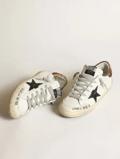 Sale Golden Goose Super-Star com estrela de couro preto e talão de couro cavalinho com estampa de leopardo Cabedal de napa branca