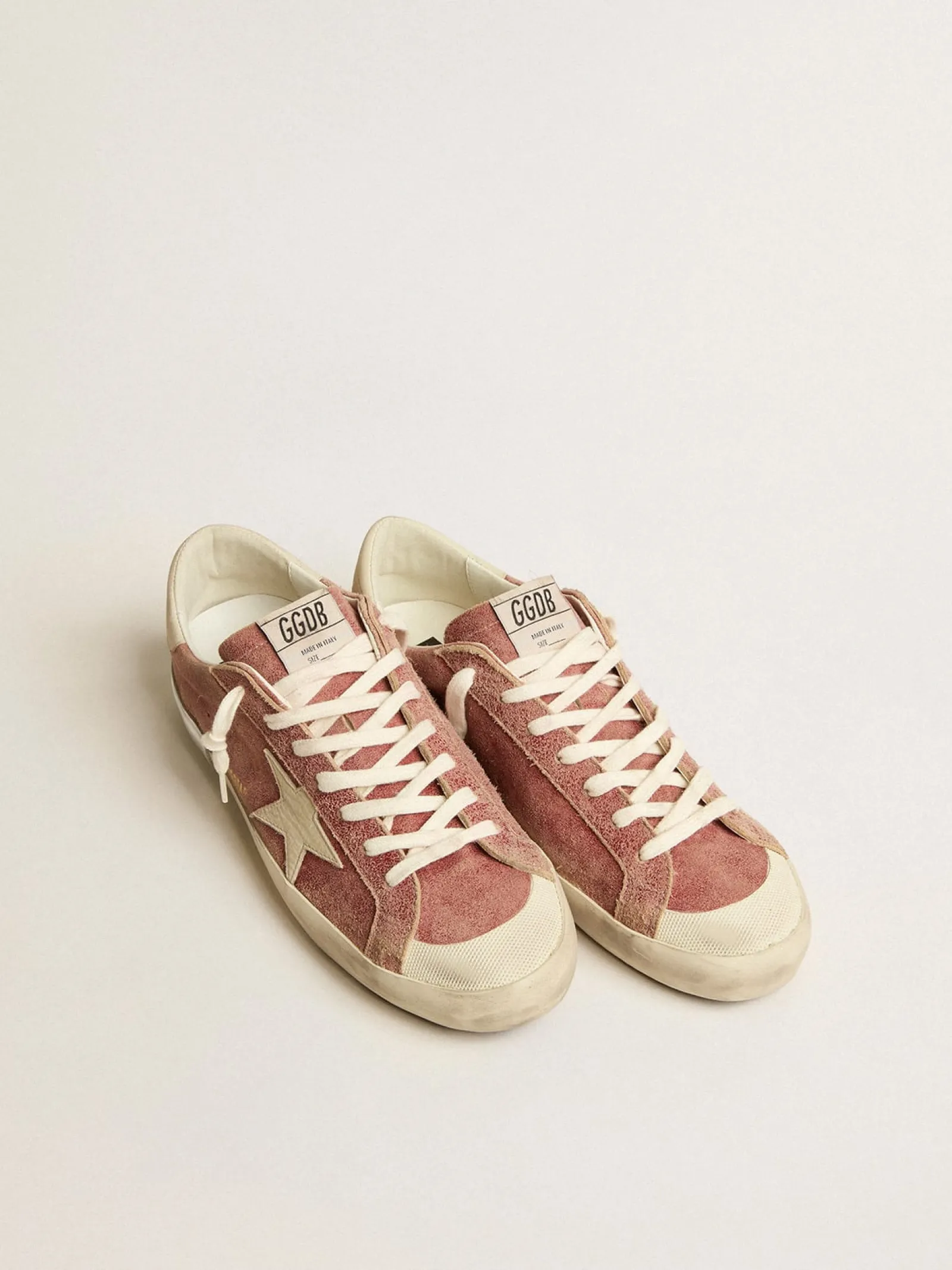 Clearance Golden Goose Super-Star de couro vermelho com estrela e talão de nubuk na cor creme Cor: vermelho romã