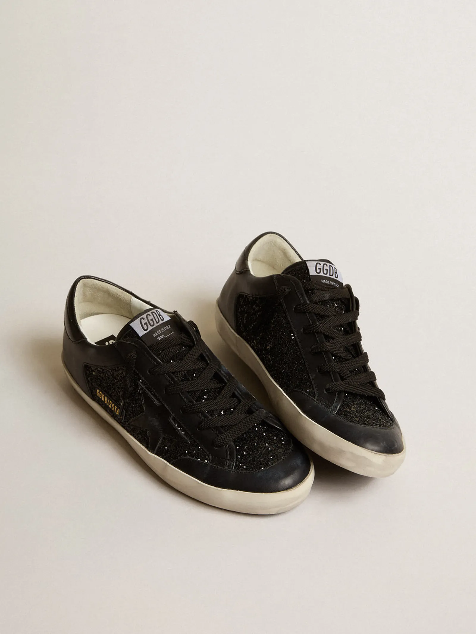 Store Golden Goose Super-Star de napa e glitter pretos com estrela de couro preto brilhante Cabedal de napa e glitter pretos