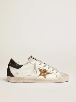 Best Sale Golden Goose Super-Star feminino com estrela dourada e talão de glitter preto Cabedal: 85% couro bovino, 11% policloreto de vinil, 4% algodão