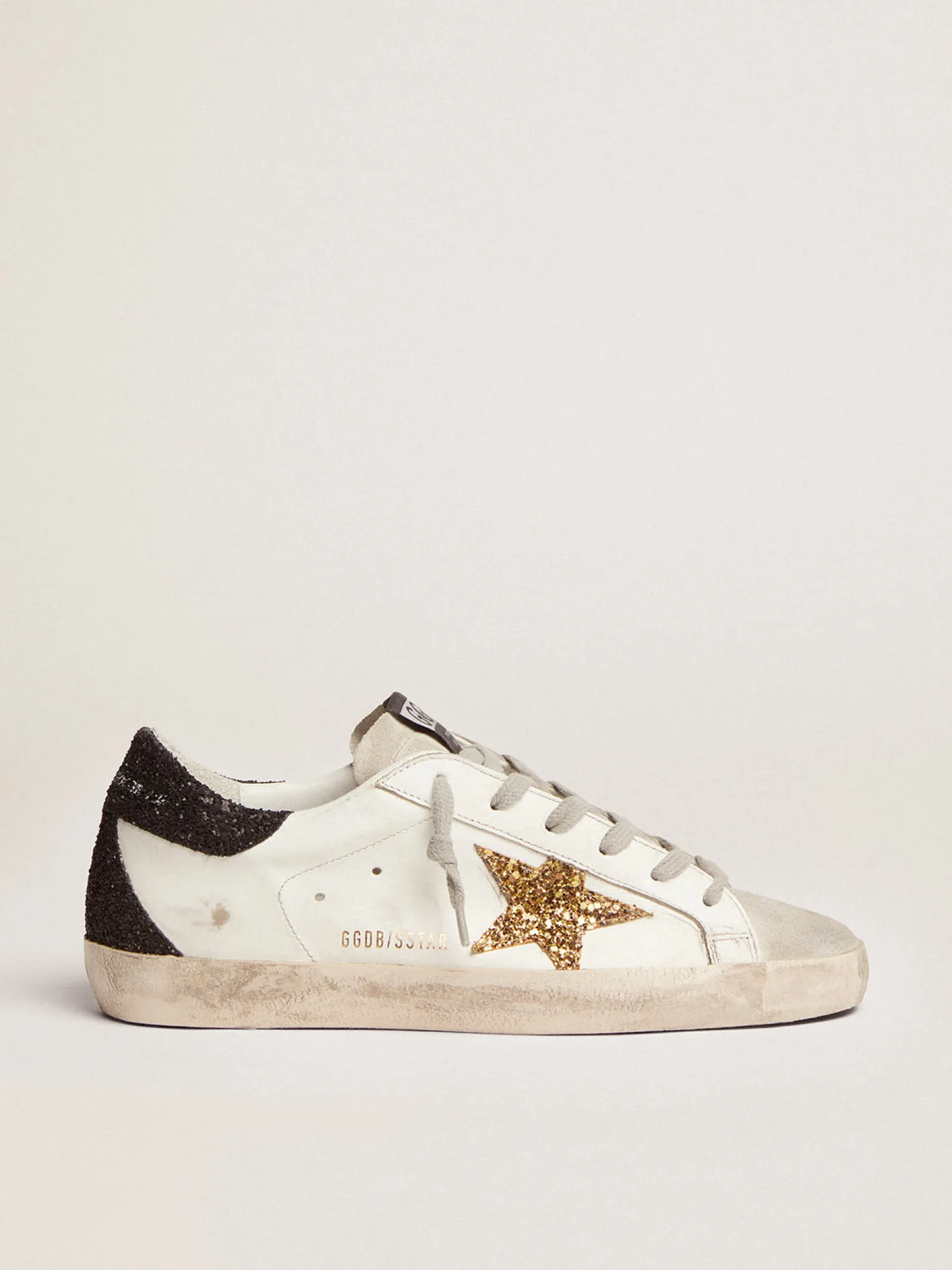 Best Sale Golden Goose Super-Star feminino com estrela dourada e talão de glitter preto Cabedal: 85% couro bovino, 11% policloreto de vinil, 4% algodão