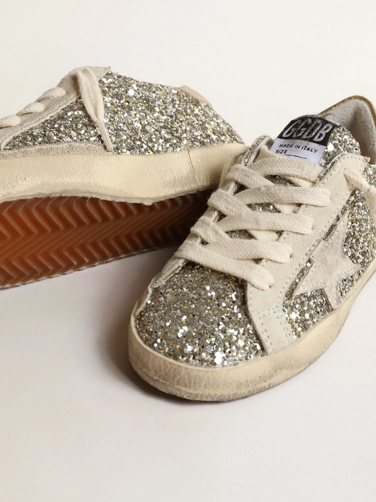 Hot Golden Goose Super-Star Junior de glitter com estrela de suede e talão dourado Cabedal de glitter platina