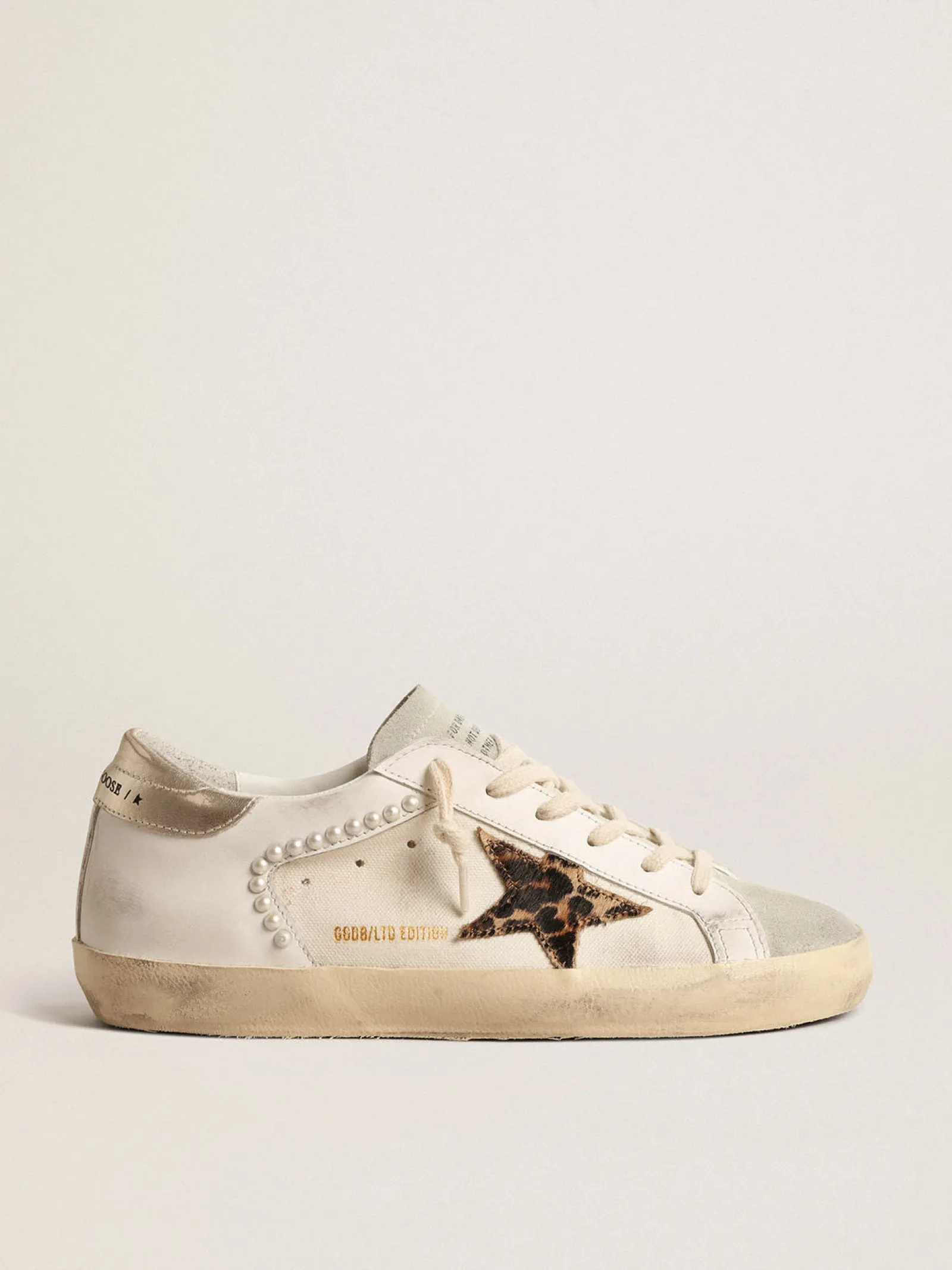 Shop Golden Goose Super-Star LTD de lona e couro com estrela de cavalinho leopardo Cabedal de lona e couro bege