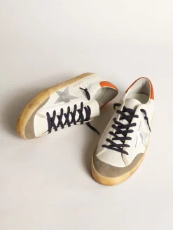 Discount Golden Goose Super-Star Penstar com estrela prateada e talão laranja Cor: branco