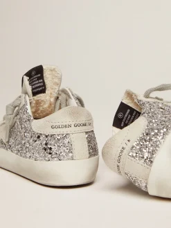 Store Golden Goose Super-Star Young com glitter prateado Cabedal: 29% polietileno, 25% poliuretano, 24% couro bovino, 11% algodão, 11% viscose