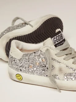 Store Golden Goose Super-Star Young com glitter prateado Cabedal: 29% polietileno, 25% poliuretano, 24% couro bovino, 11% algodão, 11% viscose