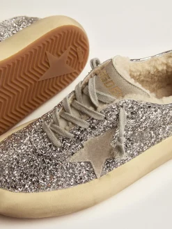 Shop Golden Goose Tênis Space-Star de glitter prateado e forro de shearling Cabedal de glitter prateado